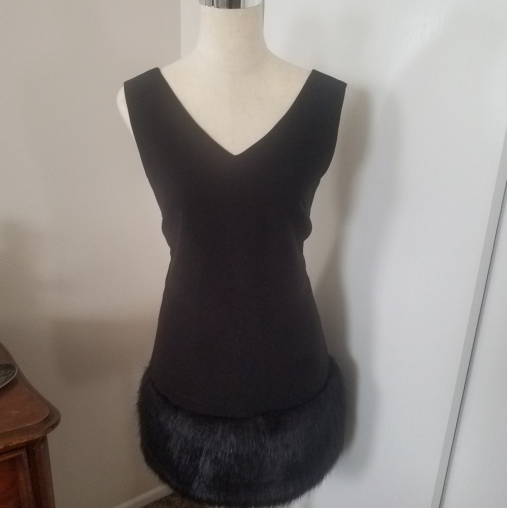 Thick fur trimmed little black dress